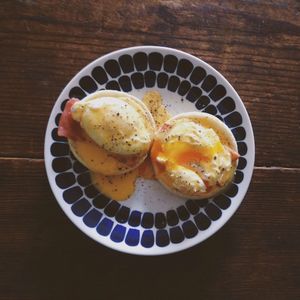 Close-up of eggs benedict served in plate