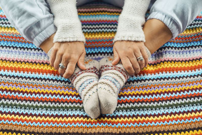 Low section of woman wearing socks