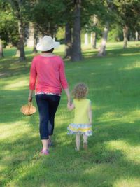 Full length of girl playing in park