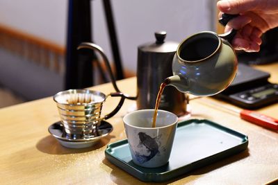 Close-up of coffee cup on table