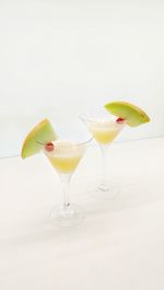 Close-up of drink against white background