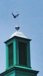 Low angle view of built structure against blue sky