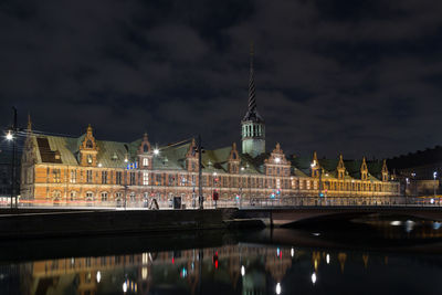 Illuminated buildings in city at night