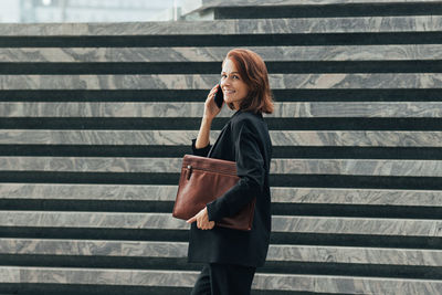 Young woman using mobile phone