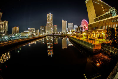 Illuminated buildings in city at night