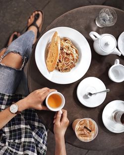 High angle view of woman having breakfast