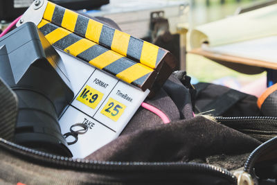 Close-up of film slate in bag