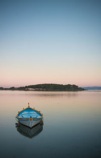 Boat in sea against clear sky during sunrise, méditerranéen sea, côte d azur