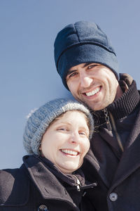 Portrait of smiling couple during winter