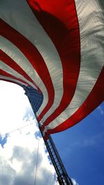 Low angle view of flag against sky