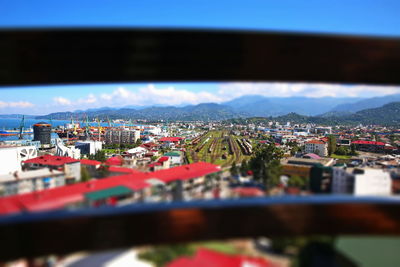 High angle view of illuminated cityscape against sky