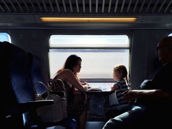 Woman sitting in train