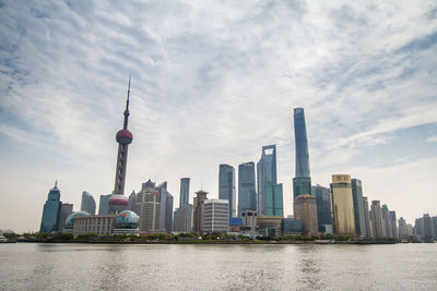 View of buildings in city against sky