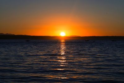Scenic view of sea against sky during sunset