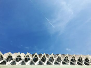 Low angle view of vapor trails against sky