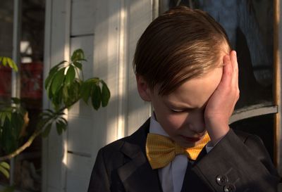 Close-up portrait of boy looking at camera