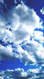 Low angle view of clouds in blue sky