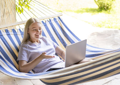 Young woman using mobile phone