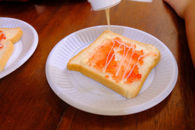 High angle view of breakfast served on table