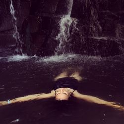 Woman relaxing in water