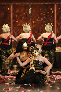 Group of people in traditional clothing during festival