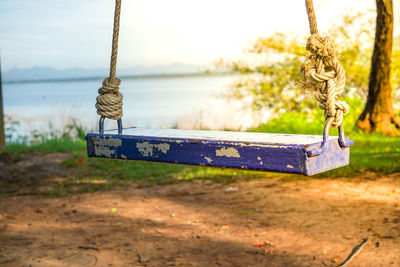 Close-up of swing in park