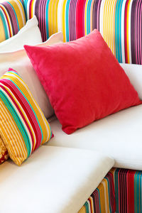 Close-up of cushions on sofa at home