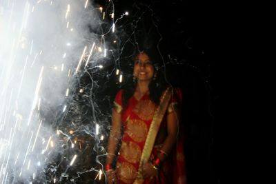 Young woman in water at night