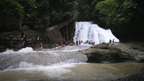 Tourists enjoying in water