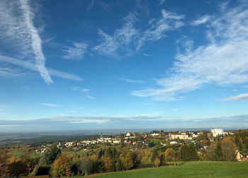 Aerial view of townscape against sky