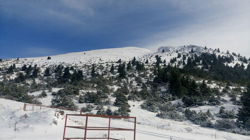 Scenic view of mountains against sky during winter