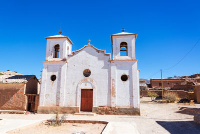 Historic cathedral against clear blue sky