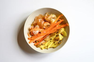 High angle view of pasta in bowl against white background