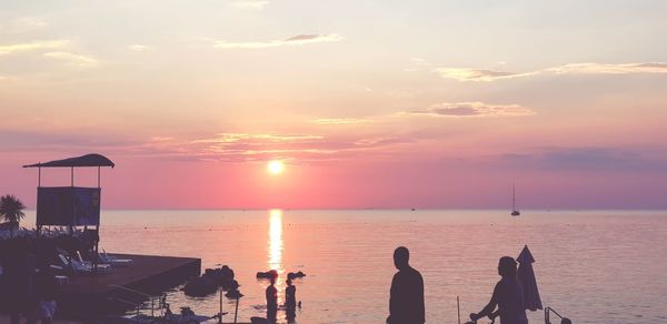 Scenic view of sea against sky during sunset