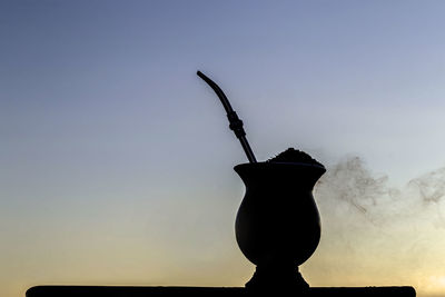 Low angle view of silhouette plant against clear sky