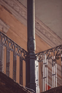 Low angle view of railing in building