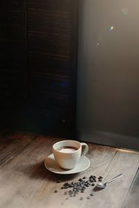 High angle view of coffee cup on table