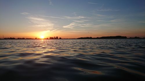 Scenic view of sea against sky during sunset