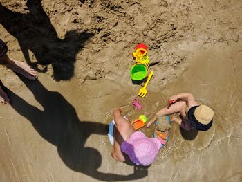 High angle view of toys on beach