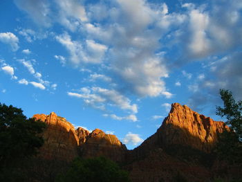 Scenic view of landscape against cloudy sky