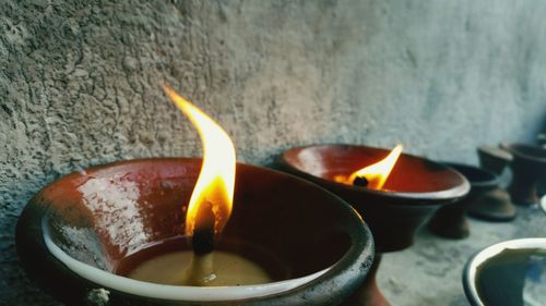 Close-up of lit candle