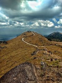 Scenic view of landscape and mountains against sky