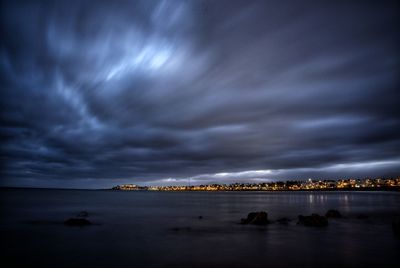Storm clouds over sea at night