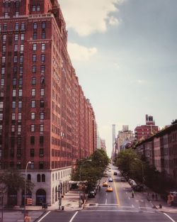 High angle view of road amidst buildings in city