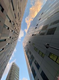 Low angle view of modern buildings against sky