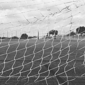 Close-up of soccer field against sky