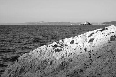 Scenic view of sea against clear sky