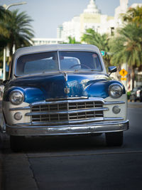 Vintage car on street in city