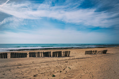 Scenic view of beach against sky