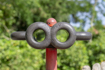 Close-up of metallic structure in garden